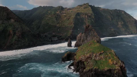 Discover breathtaking rock formations and waves of Madeira's coastline Stock Footage 321520434