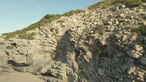 Discover breathtaking rock formations in Cala Torta, Mallorca's hidden gem Stock Footage 302993364