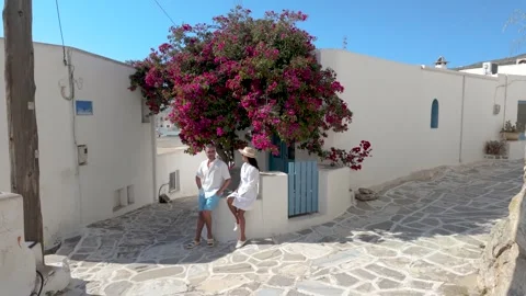 Discover the charm of Paros Greece through vibrant bougainvillea and stunning Stock Footage 337358681