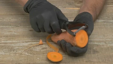 Discover efficient carrot peeling techniques to boost your culinary skills and 스톡 동영상 280602493
