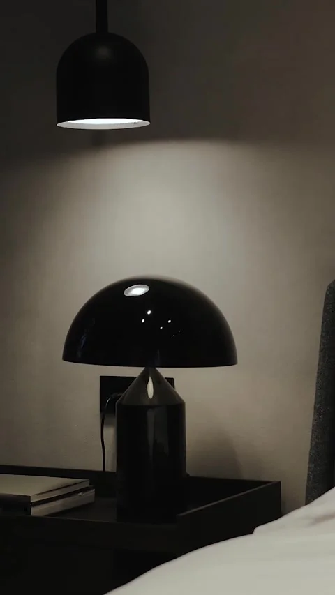 Discover the Elegant Black Table Lamp that perfectly complements a Modern Vídeo Stock 311253518