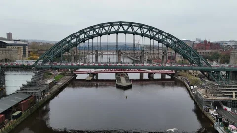 Discover the iconic architecture of Newcastle upon Tyne bridges on a grey day Stock Footage 296010460