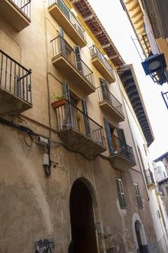Discover the iconic stone structures and quaint balconies that grace the st.. Stock Photos