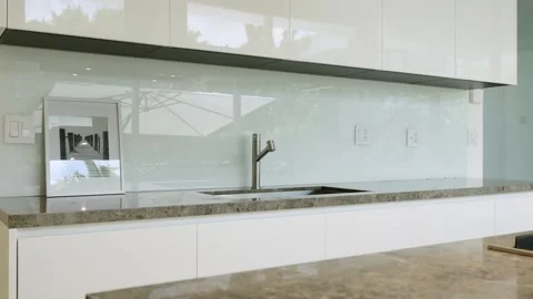 Discover a Modern Kitchen with a Sleek Design and Elegant Finishes that Inspire Stock Footage 285795365
