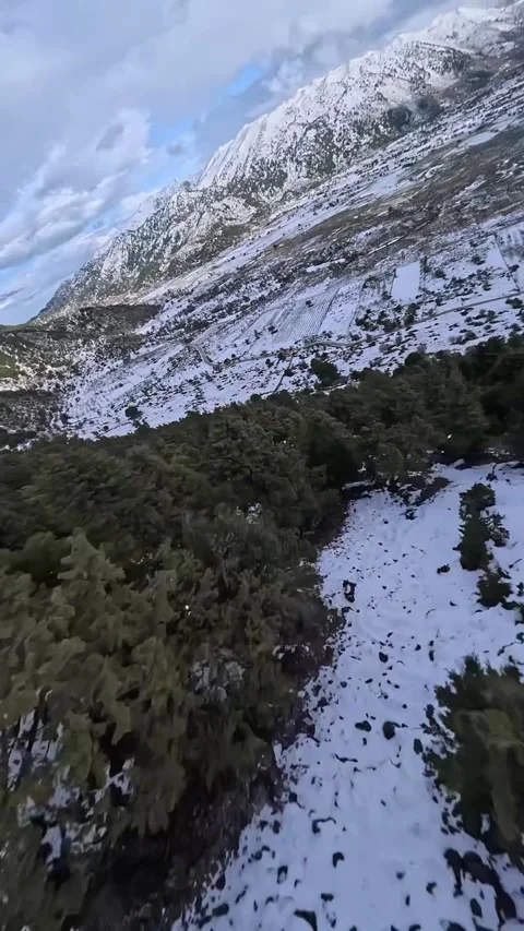 Discover Omalos Mountain in Chania, featuring snow-covered views. Vídeos de archivo 335041936