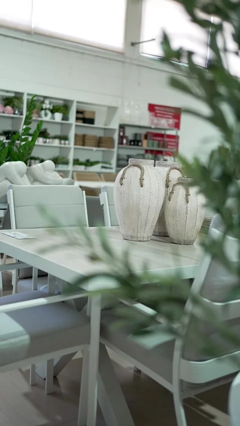 Discover stylish home decor options featuring elegant vases and modern table Stock Footage 318151243