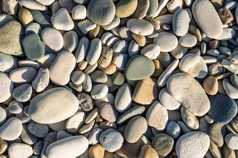 Discover tranquility with this high-resolution image of smooth beach stones.  Stock Photos