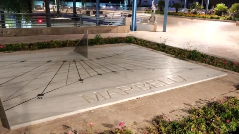 Discover unique solar time clock sign near puerto deportivo marbella through Video stock 288575004
