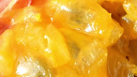 Discover the world of half a passion fruit through a captivating macro video Stock Footage 246594430