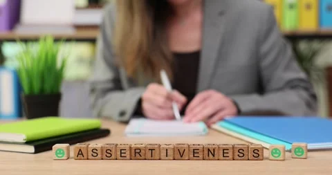 Discovering assertiveness through writing in a calm office environment during a Video stock 320945395