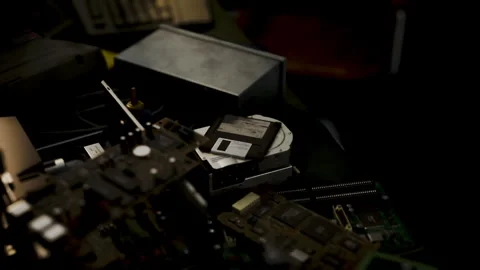 Discovering the Forgotten Tech Treasures in an Old Electronics Workshop Stock Footage 348158563