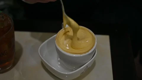 Discovering Hanoi’s Iconic Egg Coffee at Café Giảng: A Local Tradition Stock Footage 270792776