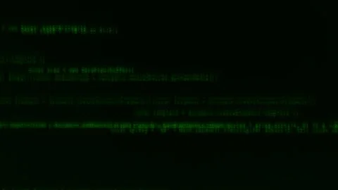 Discovering hidden messages through digital code in a dark room filled with Stock Footage 318971701