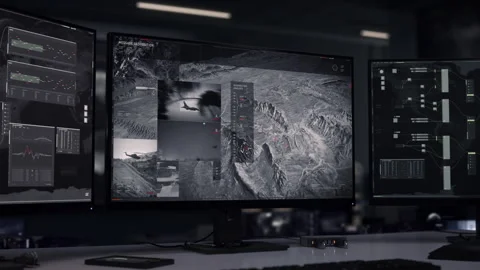 Discovering the position coordinates of the target terrorist group on a map Stock Footage 255128561