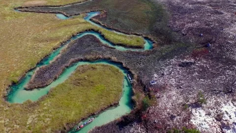 Discovering the winding rivers of Okavango Delta in Africa Stock Footage 327674633