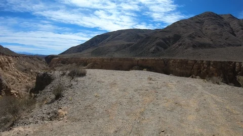 Discovering Yellow River in the Ocre Canyon, Golden water movement 스톡 동영상 103405977