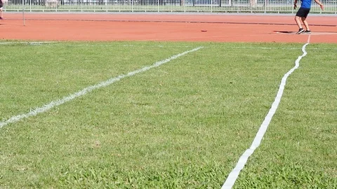 Discus Throw athletes are competing in Discus Throw on the field. Stock Footage 124771040