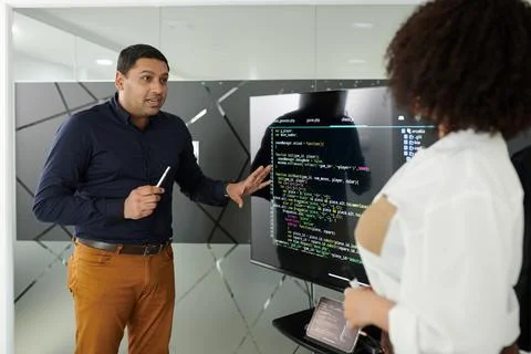 Discussing Bugs with Developer Stock Photos