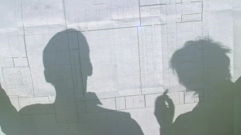 Discussing a construction plan Stock Footage