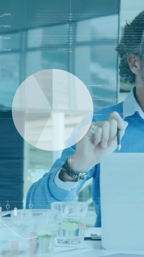 Discussing data analytics, business professionals with digital graphs overlay in Stock Footage 319727382