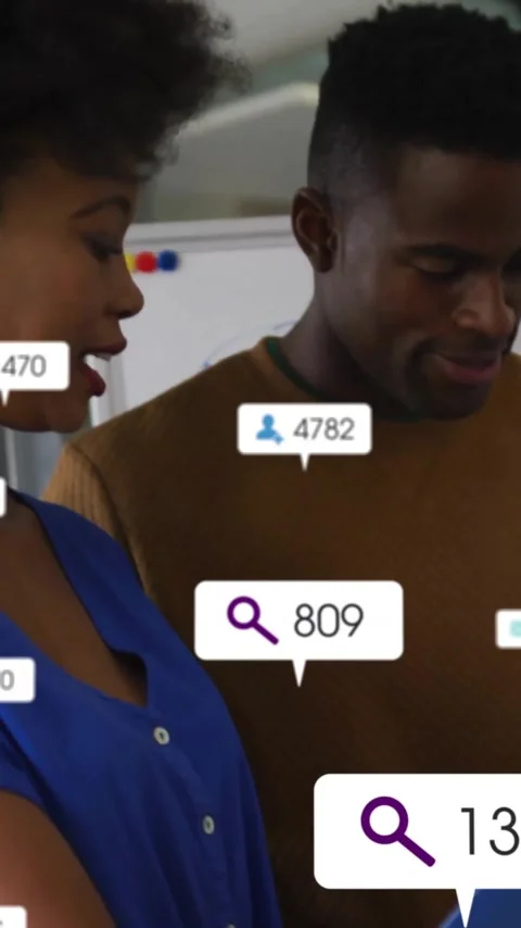 Discussing data analytics, diverse colleagues in office with animation icons Stock Footage 319811153