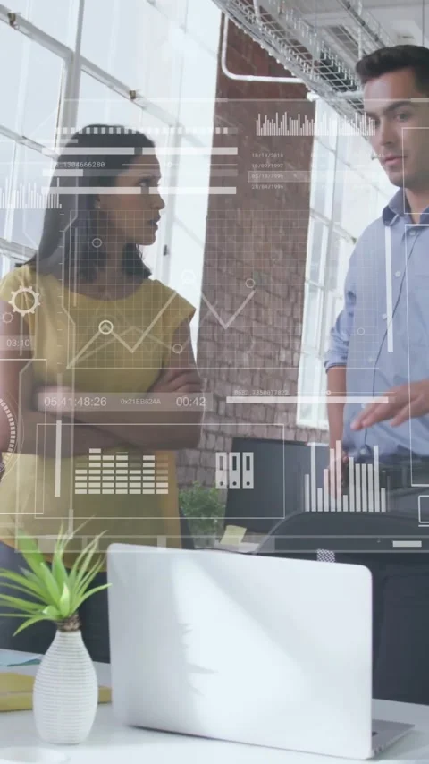 Discussing data analytics over digital interface, business professionals in Stock Footage 344404109