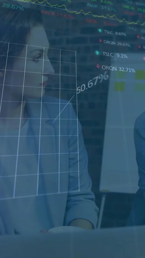 Discussing data, business professionals analyzing financial graphs in office Stock Footage 344404165
