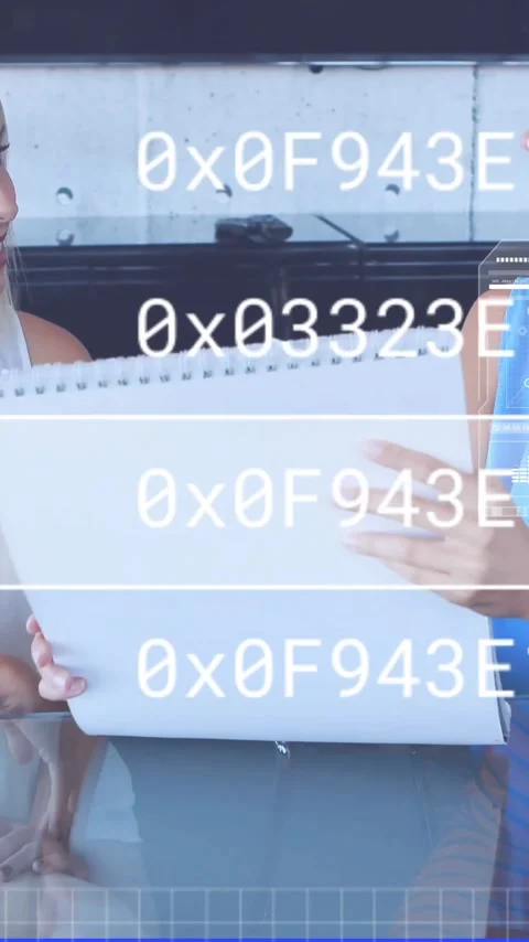 Discussing document, two women in office with data processing animation over Stock Footage 341928006