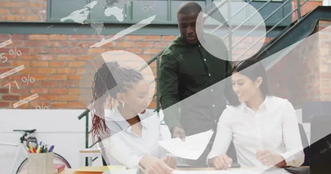 Discussing documents, diverse team in office with data processing animation Stock Footage 303947845