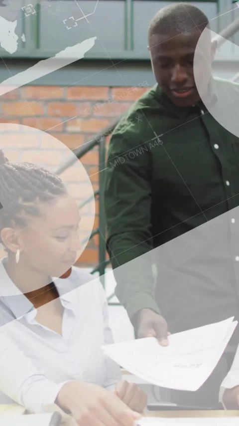 Discussing documents, diverse team in office with data processing animation Stock Footage 319727397