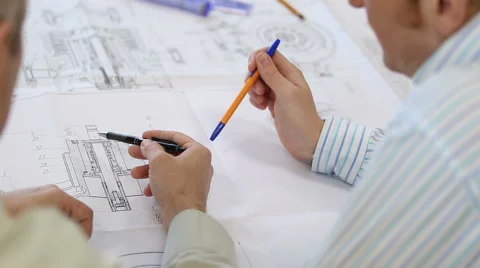 Discussing engineering drawing Stock Footage 62978940