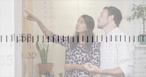 Discussing ideas in school, two people animated with transparent ruler scale Stock Footage 330591293