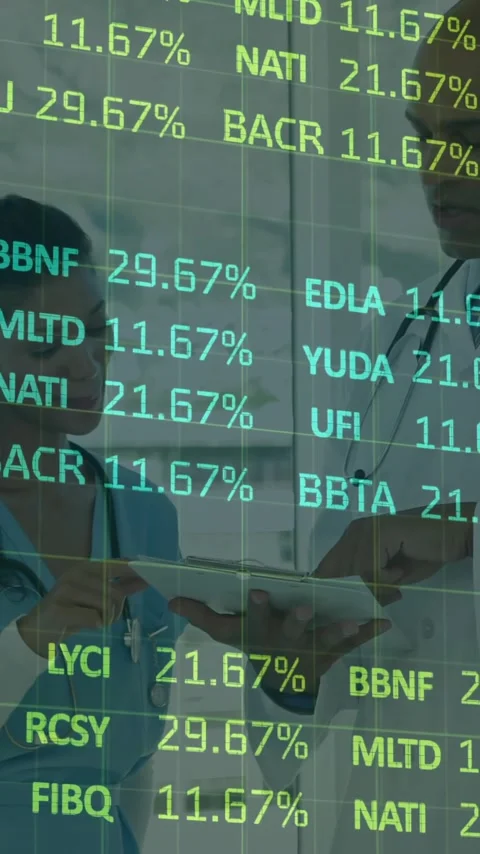 Discussing patient data, doctors with animation of stock market numbers overlay Stock Footage 344370565