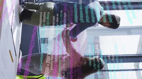 Discussing plans, people in office with digital code overlay and animation Stock Footage 313370366