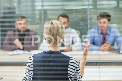 Discussing Start-up Project with Coworkers Stock Photos