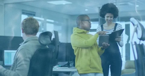 Discussing work, colleagues using tablet in modern office with animation Stock Footage 330475979