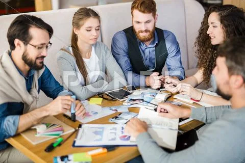Discussion of designers Stock Photos