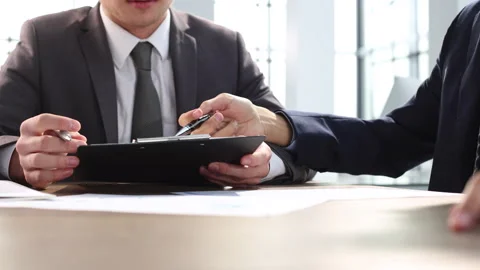 Discussion of documentation, conclusion of a contract Video stock 263665663