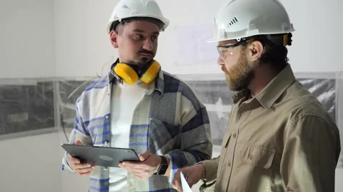 Discussion of foremen at the construction site. Stock Footage 235541268