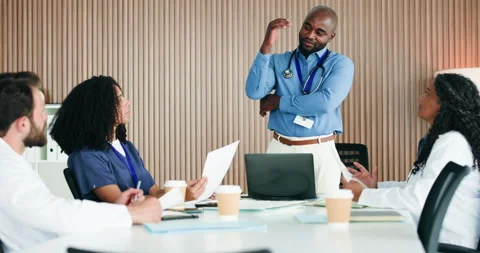 Discussion, manager or doctors with paper in boardroom, admin or operational Stock Footage 326425910