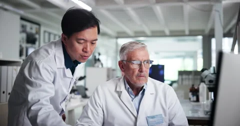 Discussion, scientist and men with computer, lab and collaboration for medical Stock Footage 305803715