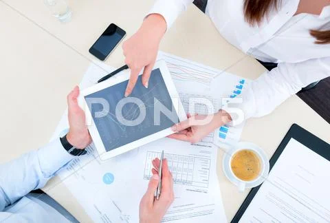 Discussion of strategy with a financial analyst Stock Photos