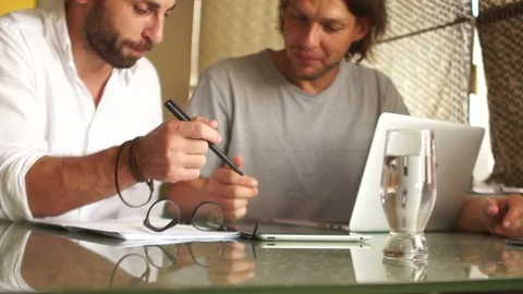 Discussion tasks in the office. Brainstorming, working discussion. young Stock Footage 97542138