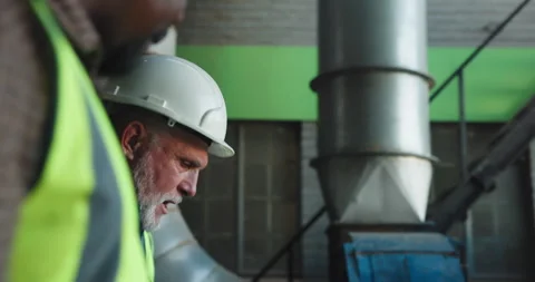 Discussion, walking and construction workers on site with planning for repairs, Stock Footage 341377342