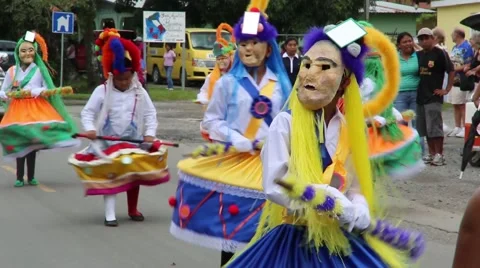 Disguised children dancing during parade Stock Footage 46224326