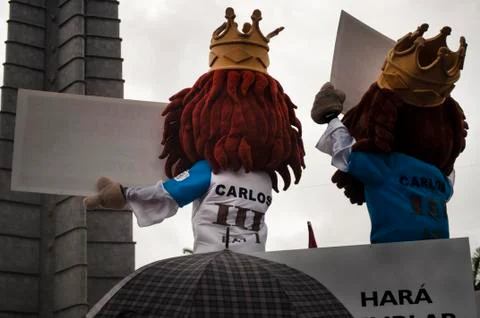 Disguised men at a demonstration Stock Photos