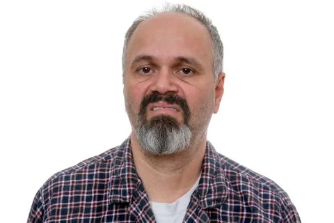 Disgusted man with beard makes face at camera Stock Photos
