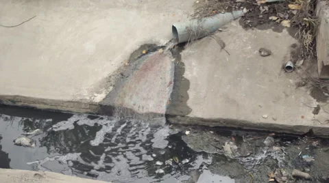Disgusting scum leaking in to the water Stock Footage 60242050