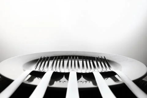 Dish and forks Stock Photos