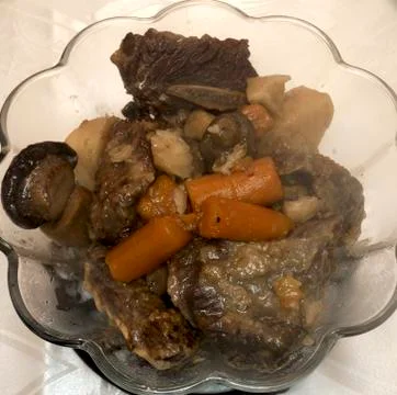 Dish with beef stew Stock Photos